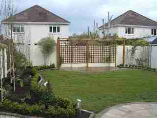 Image of completed garden lawn beds and paving