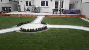 Image of New lawn path and circular paving with box hedging