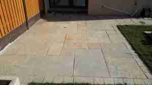 Yellow Limestone patio with yellow limestone tumbler edging