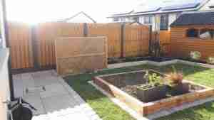 Compost bin screened and raised veg beds