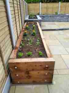 Raised sleeper beds for growing vegetables