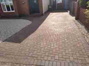Image of cleaned sanded and sealed driveway