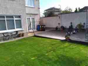 Image of original deteriorating and slippy deck with original paving to side