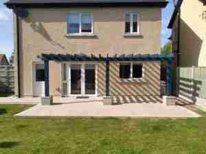 Image of new porcelain patio and timber pergola