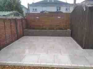 Raised bed, timber cladding and patio