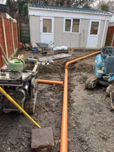Groundworks with drainage being installed