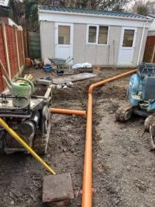 Groundworks with drainage being installed