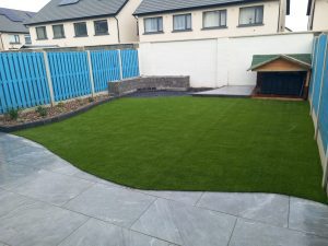 Curved porcelain patio and lawn